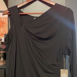 Long sleeve black dress, asymmetrical neckline